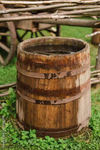 water barrels in the garden on the grass.