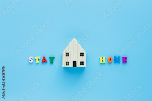 Stay home text with wooden ...