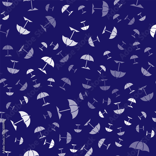 White Sun protective umbrella for beach icon isolated seamless pattern on blue background. Large parasol for outdoor space. Beach umbrella. Vector Illustration