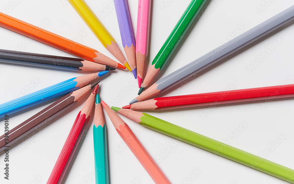 Colorful pencils with white background in a circle, unity and cooperation