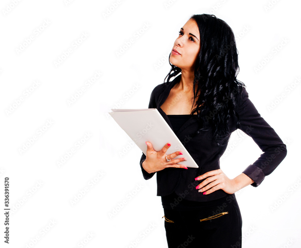 Young business woman holding a folder looking thoughtful Young business woman holding a folder looking thoughtful