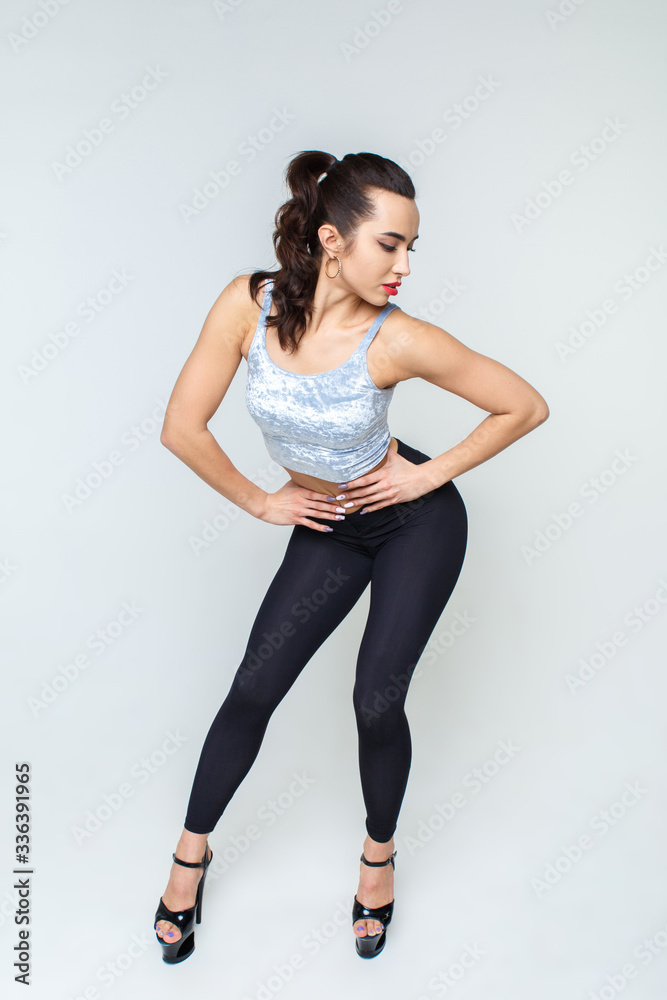 Sexy girl dancing strip on a light background. Sexy dance. Sexy girl dancing strip on a light background. Sexy dance.