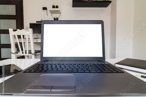 Wallpaper Mural Low angle view of a person working on a laptop from home Torontodigital.ca