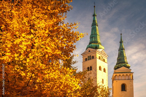 Canvas Print The Zilina town with The Holy Trinity Church tower and The Burian's Tower at autumn, Slovakia, Europe