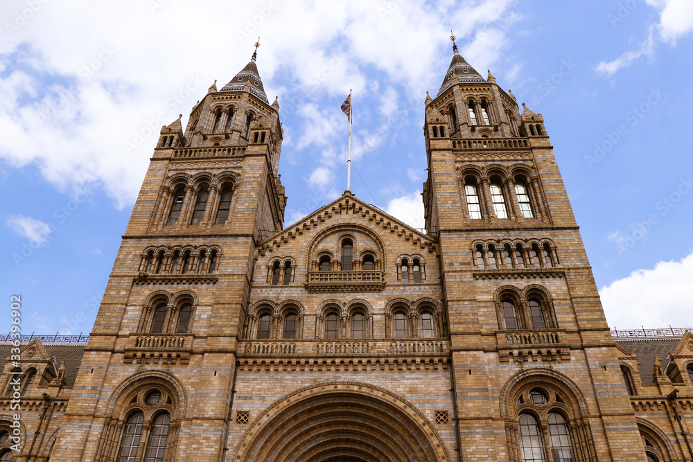 Main entrance with two towers on each side presents beautiful and large complex in London named Natural History Museum. The terracotta mouldings represent the past and present diversity of nature.