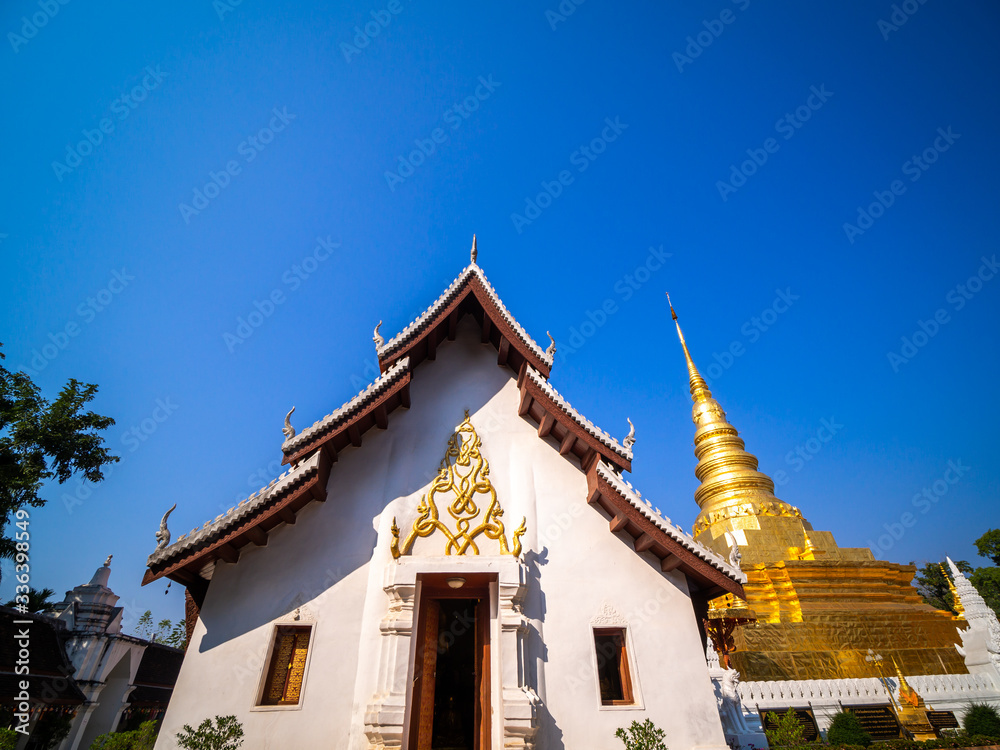 Fototapeta premium Church and The Golden Pagoda Located in The North