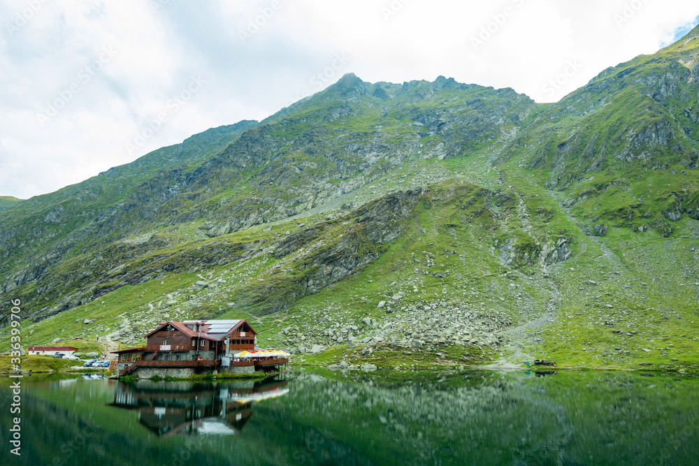 Obraz premium the lake and the mountains tell us a story in the cottage