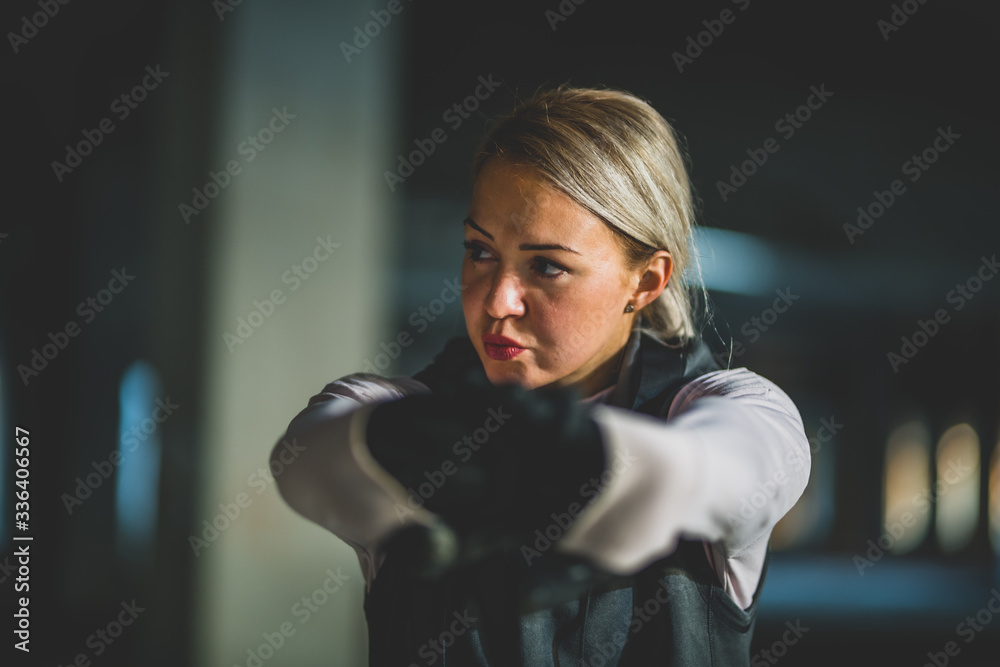 Close-up of a young Caucasian woman with arms stretched out Close-up of a young Caucasian woman with arms stretched out