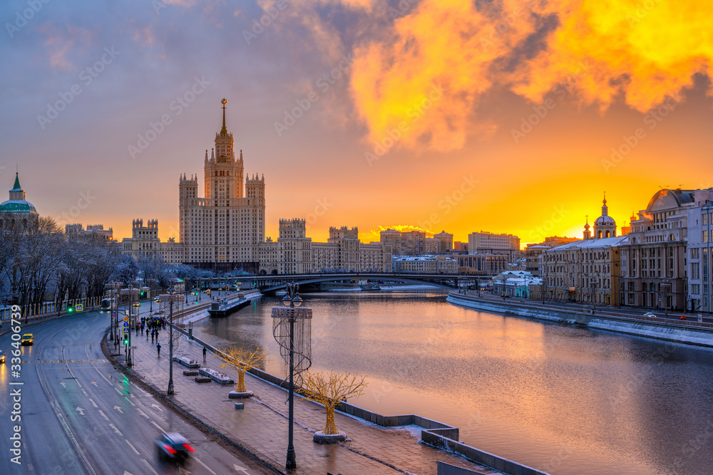 Fototapeta premium Kotelnicheskaya Embankment Building and Moscow river in Moscow, Russia. Architecture and landmark of Moscow. Sunrise cityscape of Moscow