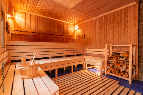 sauna bathhouse warm interior inside empty brooms barrels bucket for water