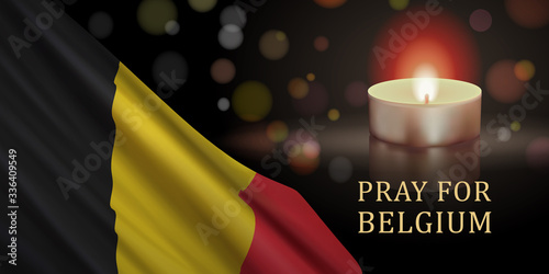 Banner design template with flag of Belgium, candle, and slogan "Pray For Belgium". Vector illustration dedicated to supporting people suffering from coronavirus disease (COVID-19) in Belgium.