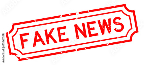 Grunge red fake news word rubber business seal stamp on white background