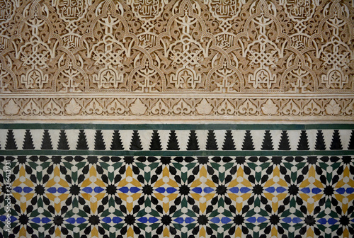 ornaments with tiles and stucco on a wall in Alhambra, Andalusien photo