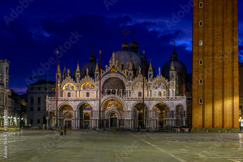 Fototapeta Naklejka Na Ścianę i Meble -  Night view of Basilica di San Marco and Campanile on piazza San Marco in Venice, Italy. Architecture and landmark of Venice. Night cityscape of Venice.