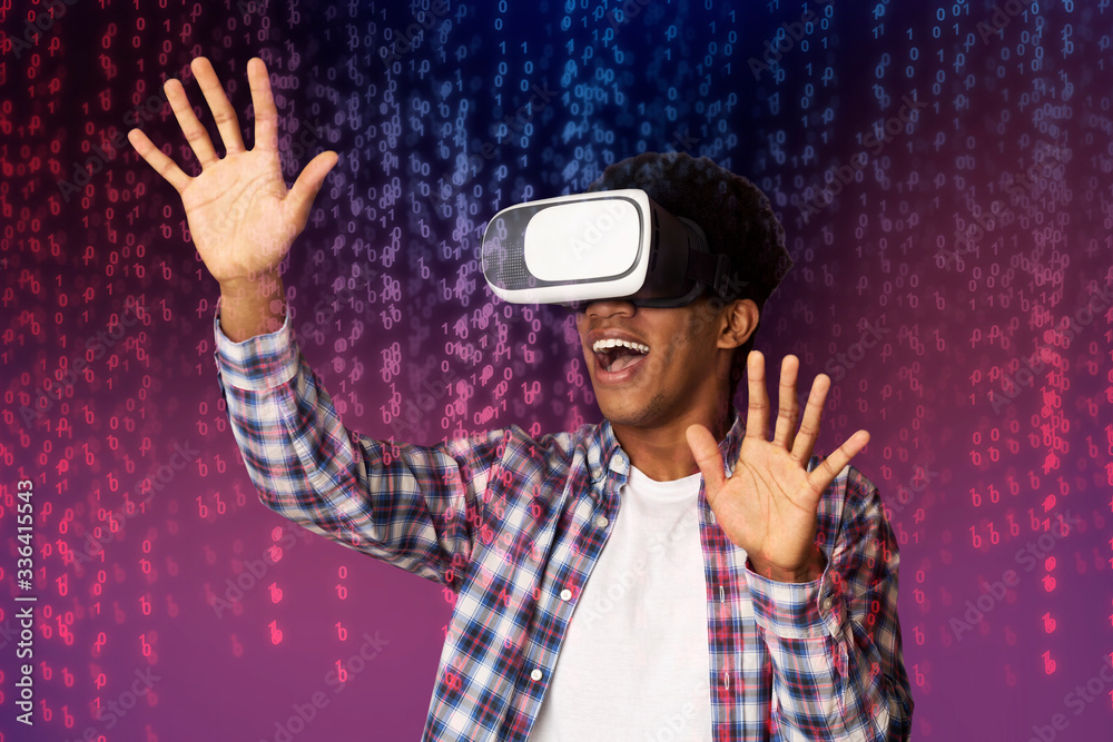 Excited Teen Guy Having Virtual Reality Glasses Experience Excited Teen Guy Having Virtual Reality Glasses Experience