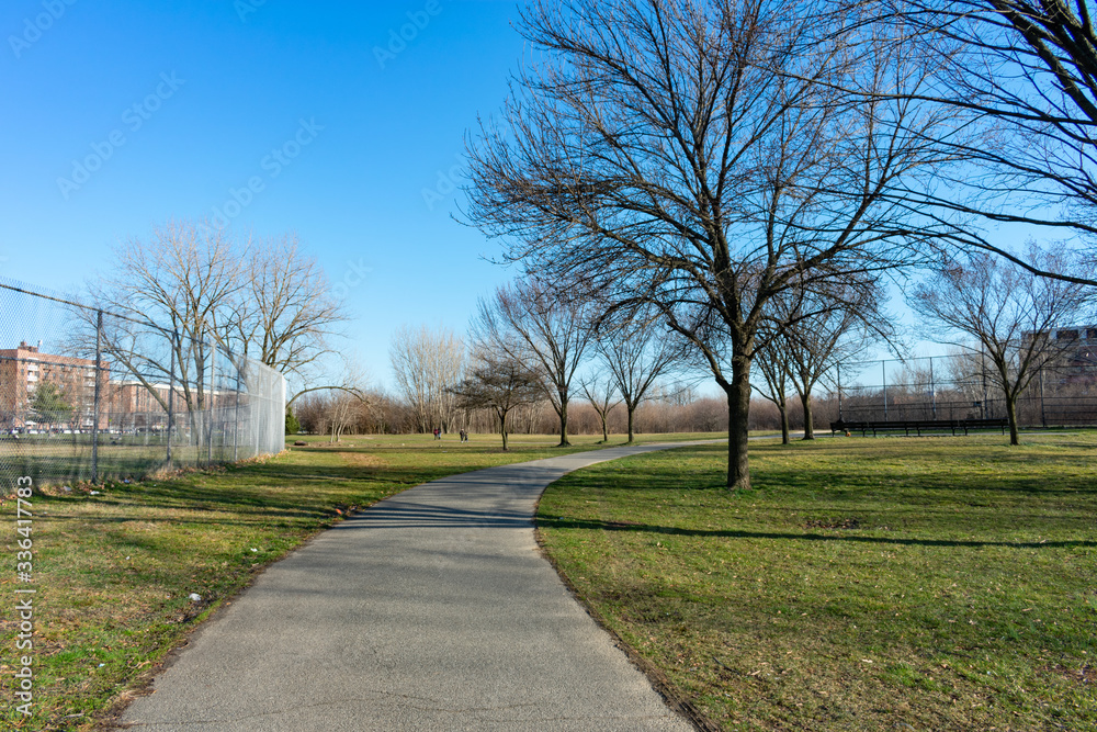Empty Curving Walkway at Kissena Park in Flushing Queens of New York City