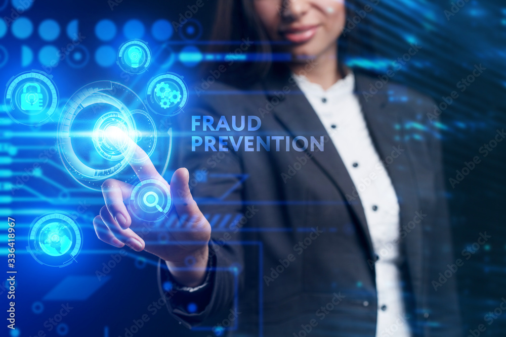 Business, Technology, Internet and network concept. Young businessman working on a virtual screen of the future and sees the inscription: Fraud prevention Business, Technology, Internet and network concept. Young businessman working on a virtual screen of the future and sees the inscription: Fraud prevention