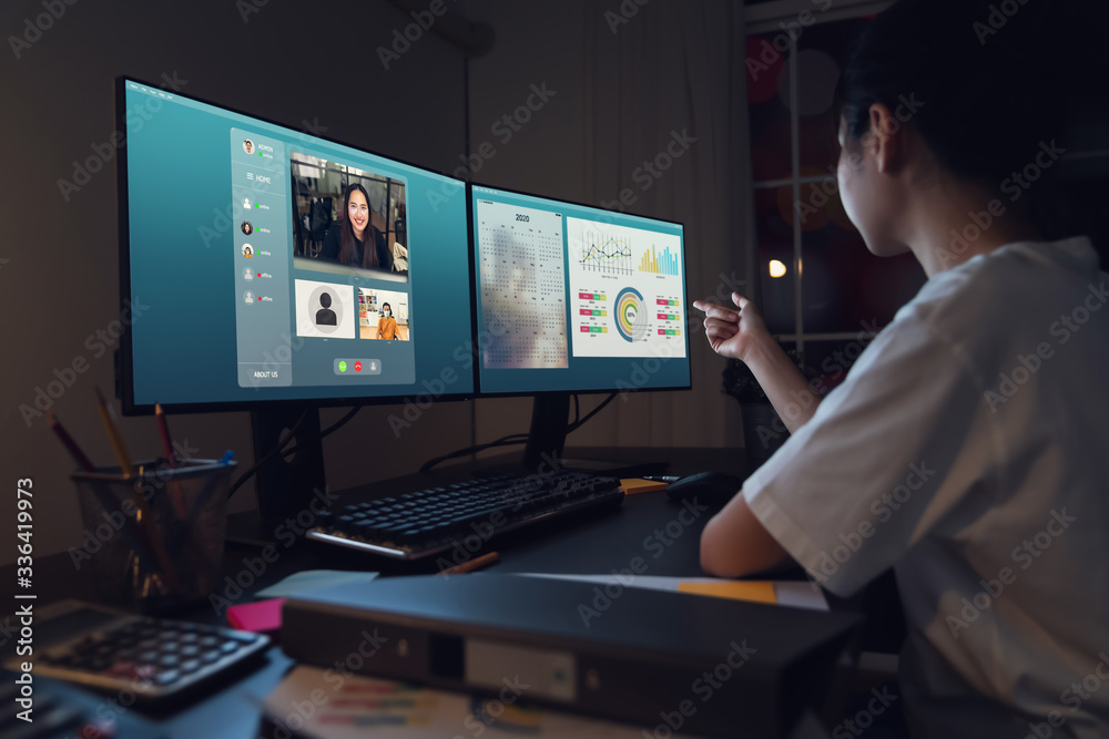 Asian businesswoman making video call meeting to team online and present work projects. Concept working from home. Asian businesswoman making video call meeting to team online and present work projects. Concept working from home.