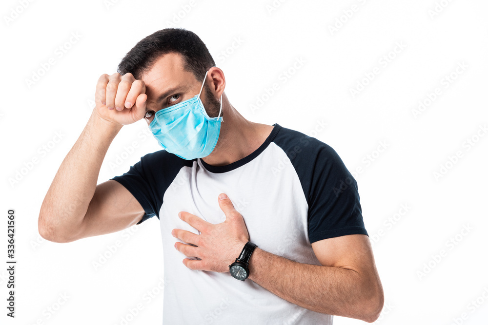 sick man in medical mask touching forehead isolated on white sick man in medical mask touching forehead isolated on white
