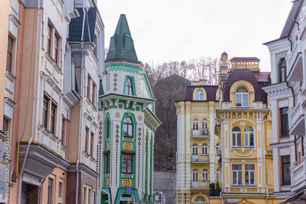 Obraz premium Colored houses in the capital of Ukraine Vozdvyzhenka, Kyiv, Ukraine 03/19/2019