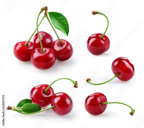 Cherry isolated. Sour cherry. Cherries with leaves on white background. Sour cherries on white. Cherry set.