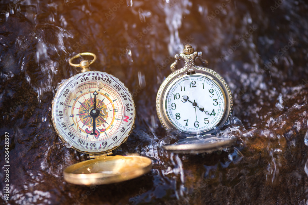 Clock and Compass placed at the waterfall.