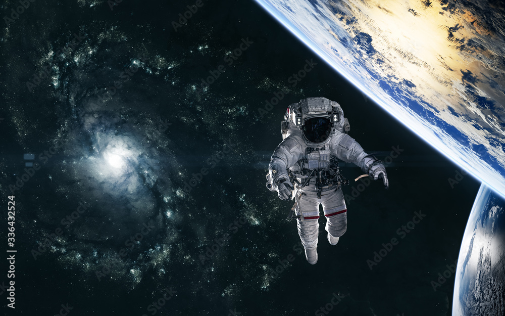 Obraz premium Astronaut, planets on background of spiral galaxy somewhere in deep space. Science fiction. Elements of this image furnished by NASA
