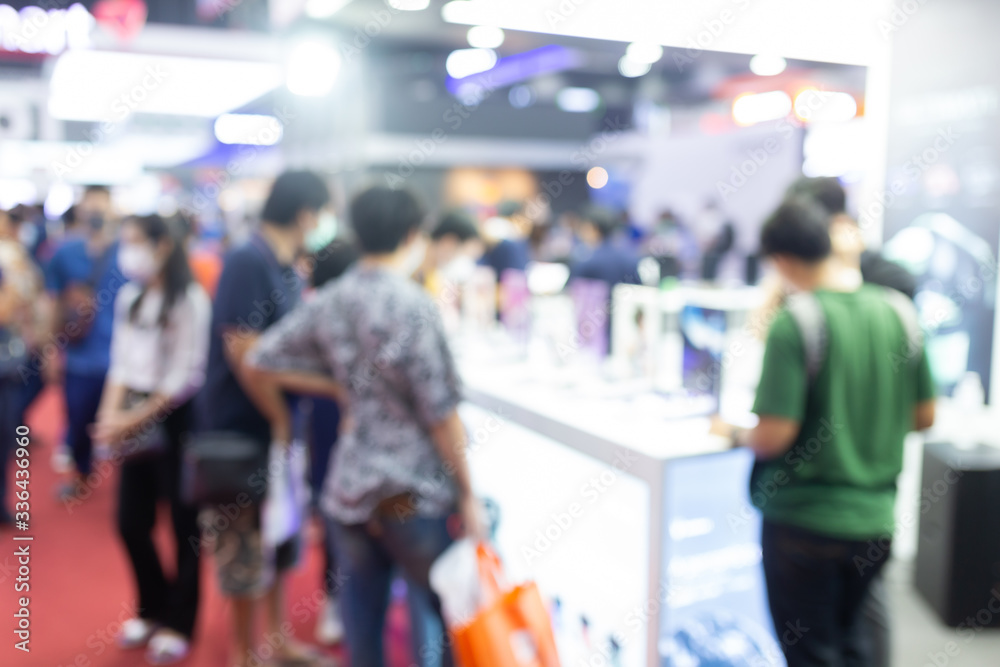 Abstract blur people in exhibition hall event trade show expo background. Business convention show, job fair, or stock market. Organization or company event, commercial trading, or shopping mall Abstract blur people in exhibition hall event trade show expo background. Business convention show, job fair, or stock market. Organization or company event, commercial trading, or shopping mall