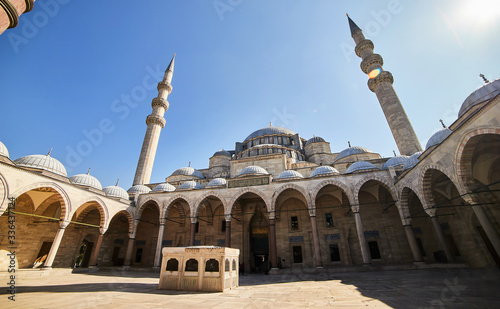 Courtyard of the old great Suleymaniye Mosque in Istanbul, Turkey is a famous landmark of the city. Magnificent Islamic Ottoman architecture.