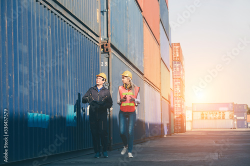Foreman of container inspection workers prepare export products photo