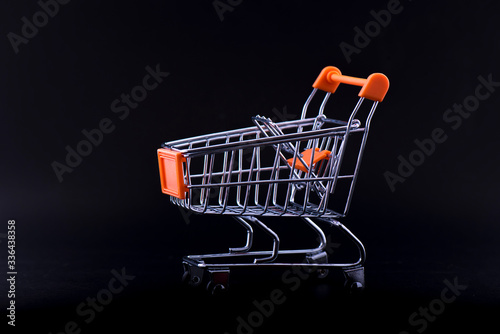 Shopping cart on a black background.