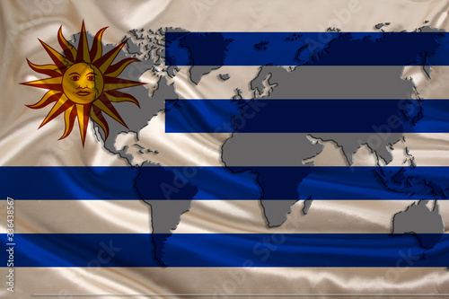 silk national flag of modern state of Uruguay with beautiful folds, concept of tourism, travel, emigration, global business photo