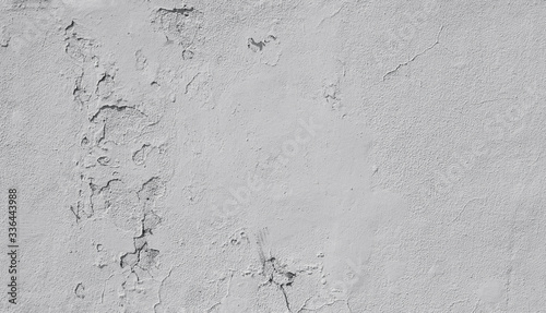 Tablou pe pânză Close-up of a weathered and old concrete wall, paint is peeling off