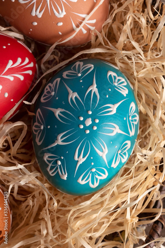 Blue Easter egg decorated with wax, top view