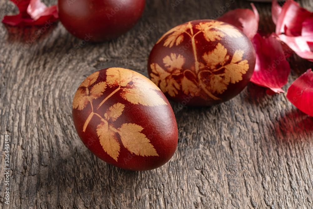Closeup of Easter eggs dyed with onion peels with a pattern of leaves Closeup of Easter eggs dyed with onion peels with a pattern of leaves