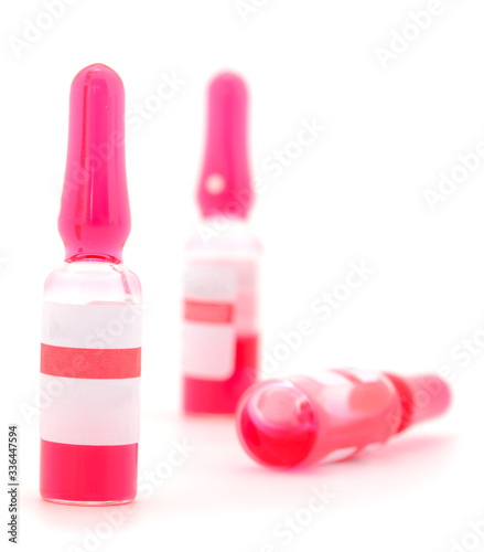 Glass medical vials of biotech drugs.