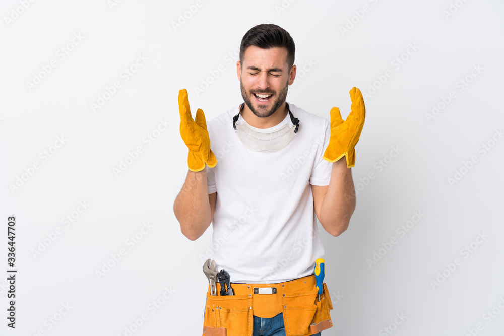 Craftsmen or electrician man over isolated white background laughing Craftsmen or electrician man over isolated white background laughing