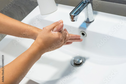 Washing hands rubbing with soap woman for corona virus prevention, hygiene to stop spreading coronavirus