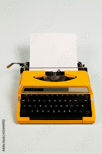 Mechanical portable typewriter made in 1980. 1980 portable typewriter made of metal and lead material.