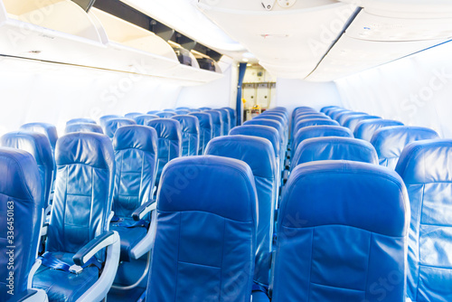 Empty plane interior with no people during coronavirus pandemia