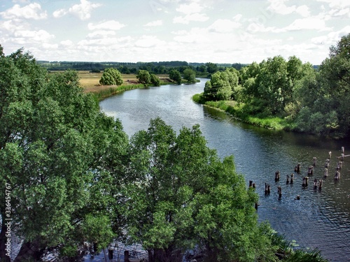 Seim river in the Kursk region with a destroyed wooden bridge. photo