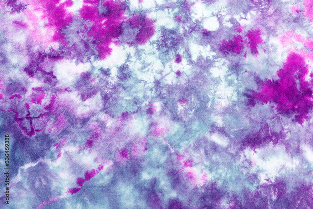 tie dye pattern hand dyed on cotton fabric abstract texture background. tie dye pattern hand dyed on cotton fabric abstract texture background.