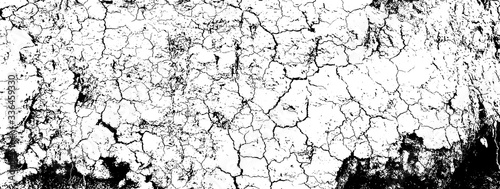 Distressed overlay texture of rough surface, dry soil, cracked ground. Grunge background. One color graphic resource.