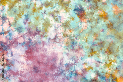 tie dye pattern hand dyed on cotton fabric abstract texture background. © p-fotography