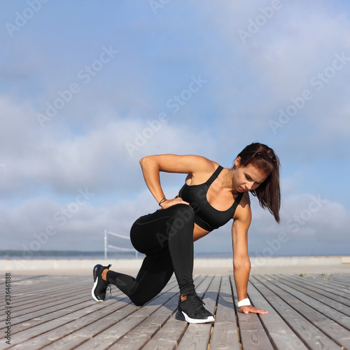 young athletic woman doing exercise