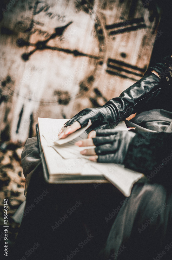 Naklejka premium young woman reading a book