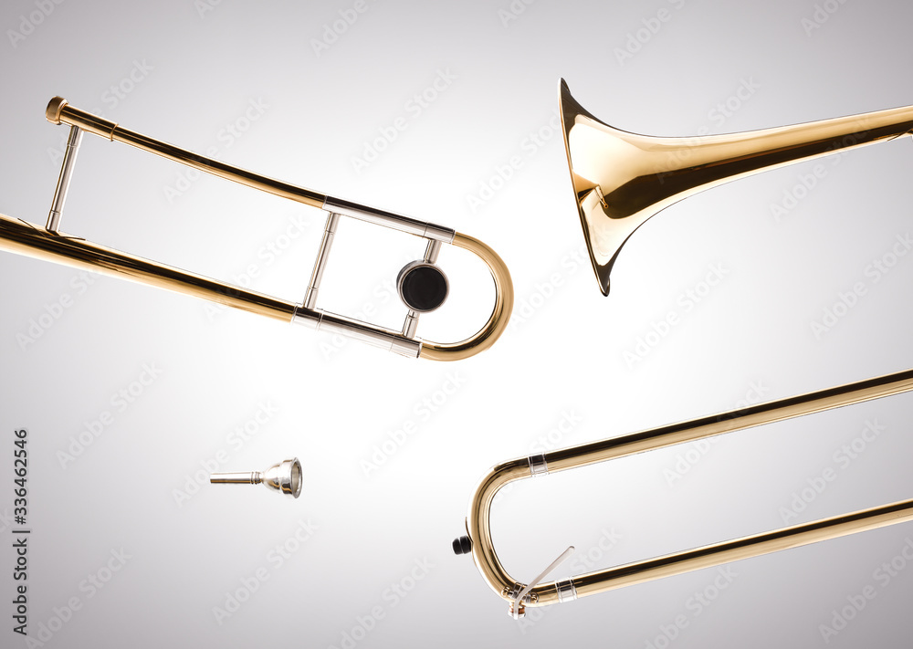 Obraz premium Trombone disassembled with white gradient isolated background