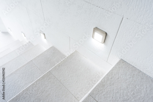 White minimalistic stairs with led lights