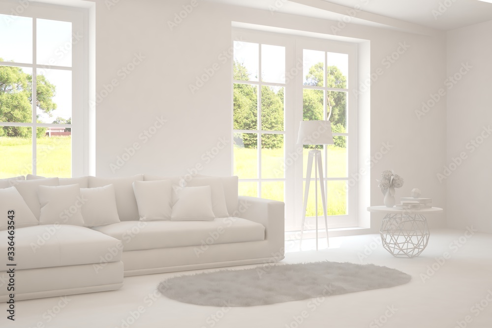 Fototapeta premium White living room with sofa and summer landscape in window. Scandinavian interior design. 3D illustration