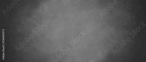 abstract gray background with dimming at the edges  highlighting the center